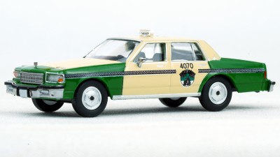 BR19712- Brekina HO 1987 Chevrolet Caprice Sedan - Chicago Taxi (green/yellow)