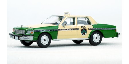BR19712- Brekina HO 1987 Chevrolet Caprice Sedan - Chicago Taxi (green/yellow)